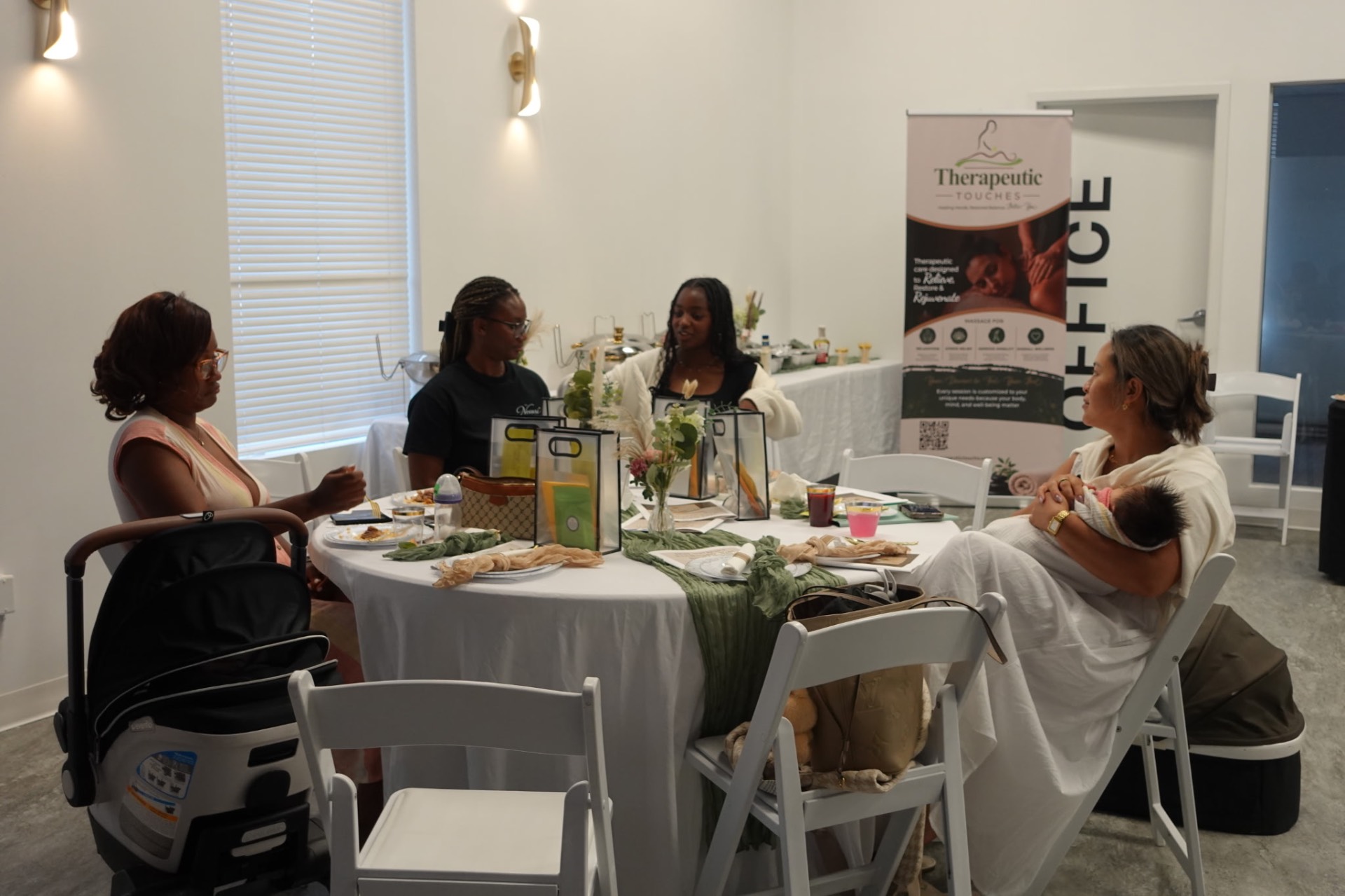 Guests seated together sharing a meal at the retreat