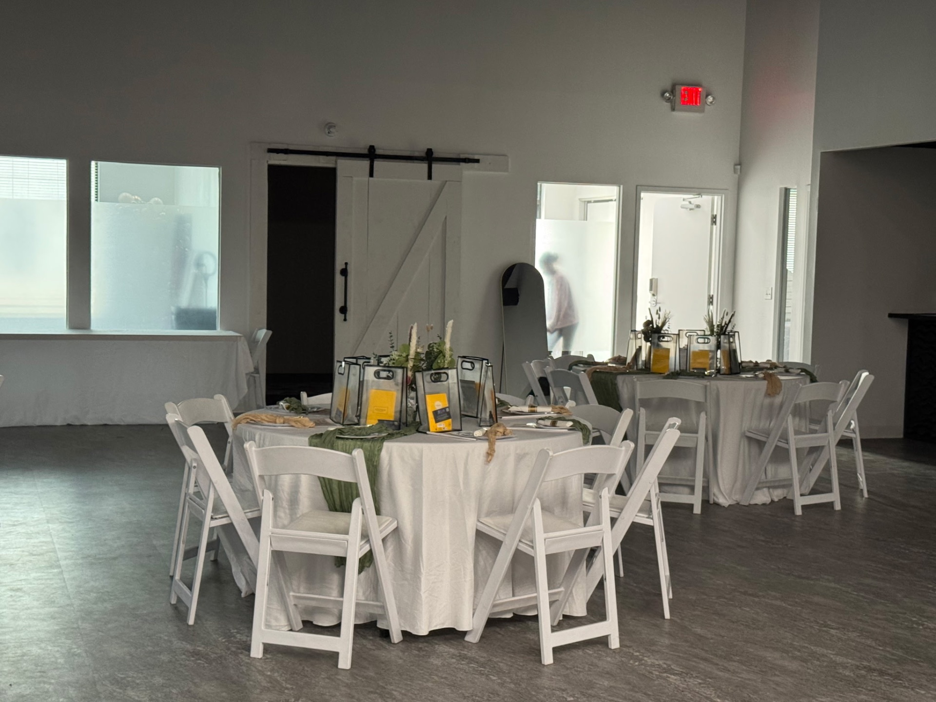Styled retreat tables with florals and guest gift bags